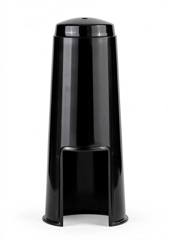 Alto saxophone mouthpiece caps placed beside a saxophone case